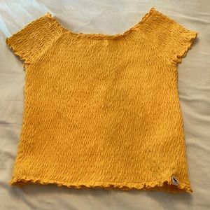The shirt that i’m selling is a nice yellow shirt that is from abercrombie kids.